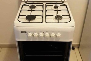 Cuisiniere a gaz + four electrique